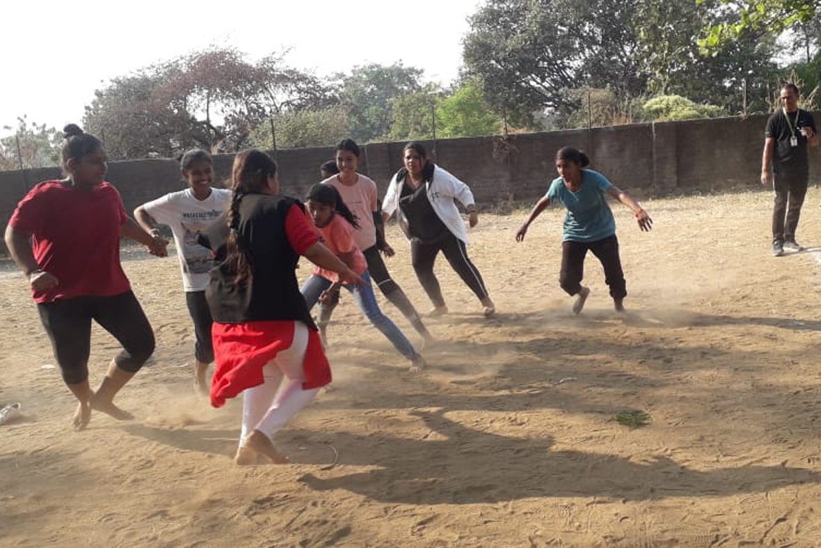 Students playing sports on the playground